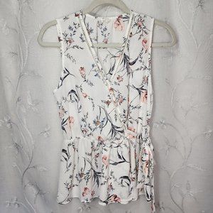 Sienna Sky Sleeveless, Faux-Wrap, V-neck Blouse.